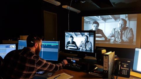 Dave in the edit suite editing audio